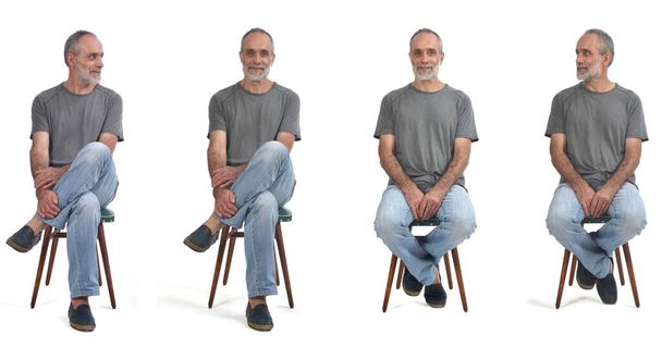 gruppo di stesso uomo seduto su una sedia su sfondo bianco - Foto, immagini