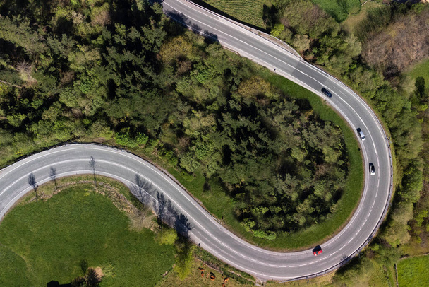 Mountain road, linked curves seen from the air with a drone - Foto, Bild