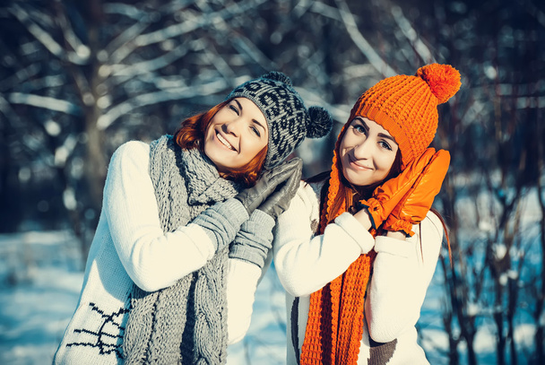 two girl friends in winter outdoors - Photo, Image