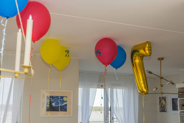 Close up view of colorful helium balloons as decoration for birthday party. Sweden. Uppsala. 04.18.2022. - Foto, immagini