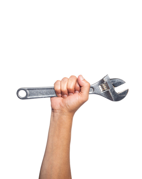 Рука працівника з ключем на білому тлі. плакат робочого дня
 - Фото, зображення