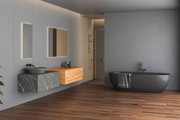 Dunkles Badezimmer mit schwarzem Parkettboden, schwarzer Badewanne, schwarzer Toilette und quadratischen Spiegeln, Dusche, Seitenblick. Minimalistisches schwarzes Badezimmer mit modernen Möbeln. 3D-Darstellung - Foto, Bild