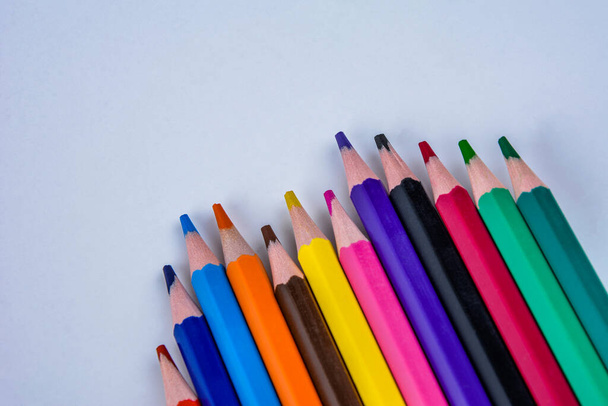 Many colored pencils.Set of sharpened color pencils .Colored pencils making a wave .An image of set of color pencils. - Fotó, kép