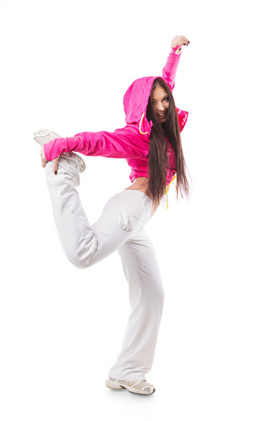 Young modern flexible hip-hop dance girl standing on one leg.  - Fotó, kép
