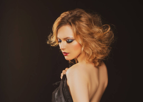 Sexy bare shoulders. Woman with fashion smokey eyes makeup. Visage, beauty salon, cosmetics. - Zdjęcie, obraz