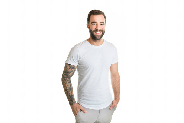 A portrait of casual young man with beard white background - Foto, Imagem