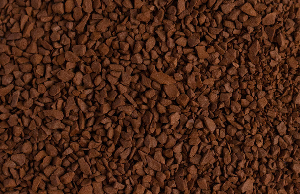 Instant coffee as background. Instant coffee close-up, top view. - Foto, Imagem