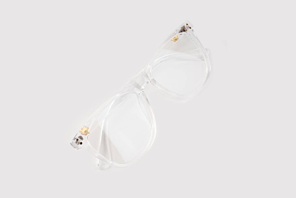Eye glass on white background. Transparent frame for glasses. Glasses for sight. - Photo, Image