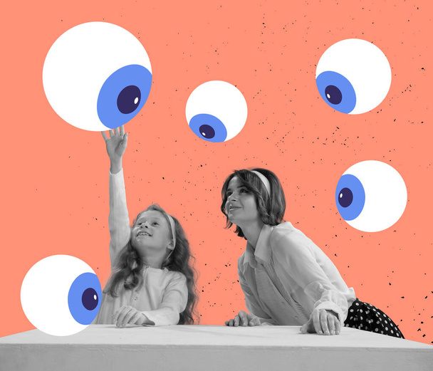 Contemporary art collage. Mother and little daughter sitting under many eyes drawings isolated over peach background. Social influence - Foto, Imagem