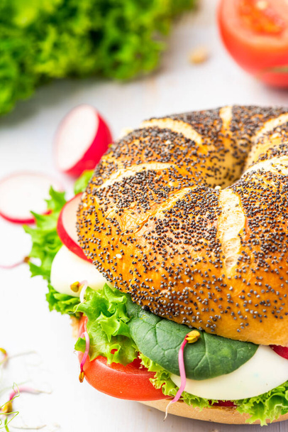 Fresh Bagel with Spring Vegetables. Healthy Breakfast Idea. - Photo, image