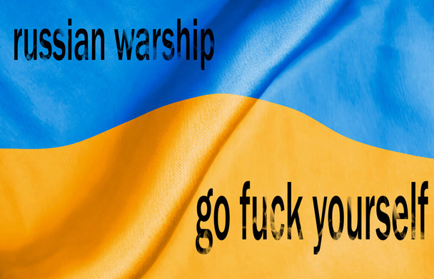 Ukrainian flag with the inscription, Russian warship go fuck yourself - Valokuva, kuva