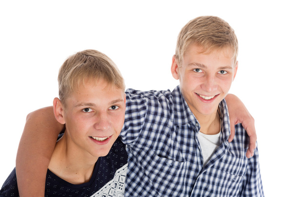 Twin brothers hugging each other - Foto, Bild