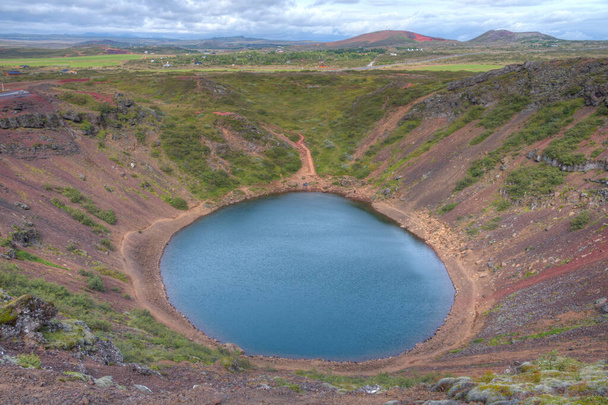 Blue volcanic lake at Kerid crater on Iceland - Фото, изображение