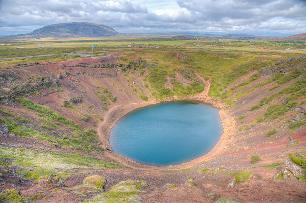Blue volcanic lake at Kerid crater on Iceland - Foto, immagini
