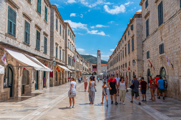 Dubrovnik, Croatia, July 25, 2020: People are strolling through Stradun street in Dubrovnik, Croatia - Zdjęcie, obraz