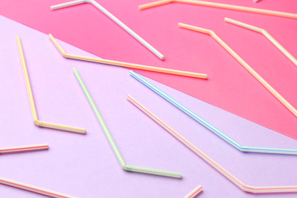 Stylish straws for drinks on pink background - Fotoğraf, Görsel