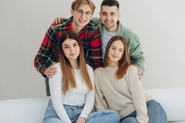 Portrait of group of friends having fun at home and enjoying together - Photo, Image