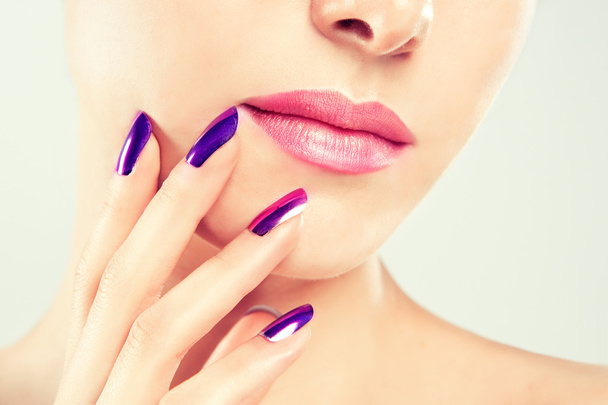 Beautiful purple nails and soft lips - Photo, image