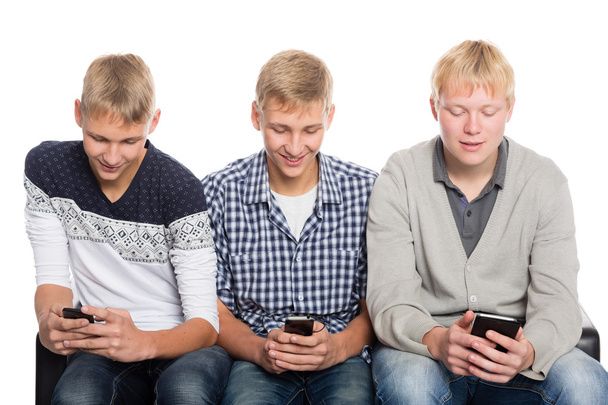 Young guys use smartphones - Photo, Image