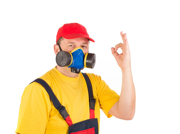 Worker in gas mask - 写真・画像
