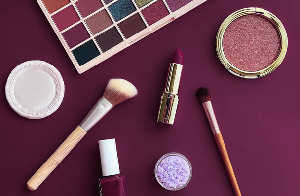 Beauty, make-up and cosmetics flatlay design with copyspace, cosmetic products and makeup tools on purple background, girly and feminine style concept - Photo, Image