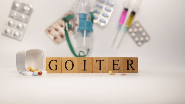 goiter was created from wooden cubes. Diseases and treatments. - Photo, image