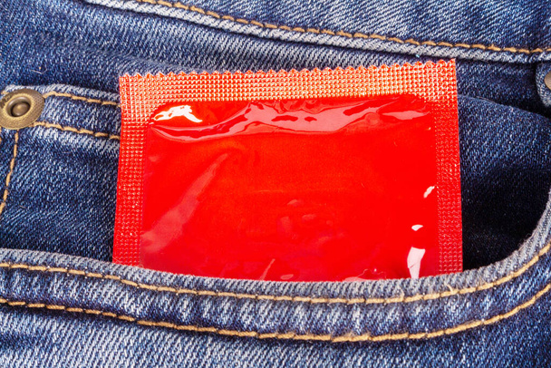 condom jeans sexual protection man. - Zdjęcie, obraz