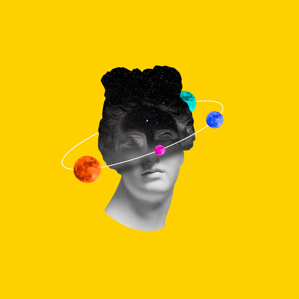 Contemporary art collage. Antique statue bust with colorful planets around head isolated over bright yellow background - Photo, Image
