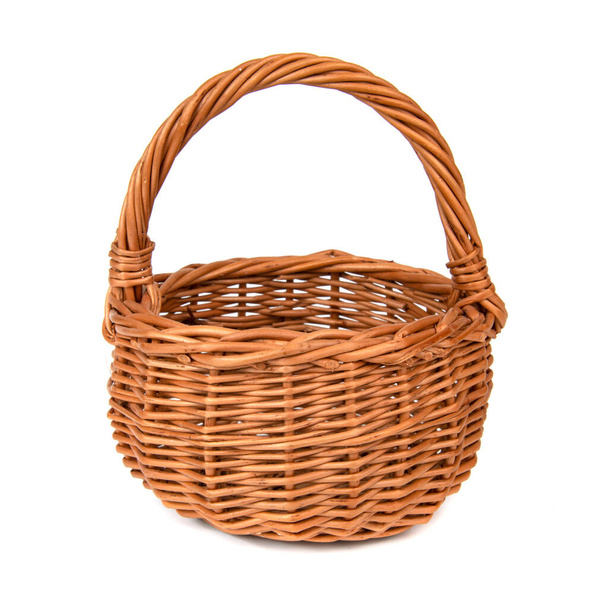 Wicker brown basket isolated on the white background - Фото, изображение