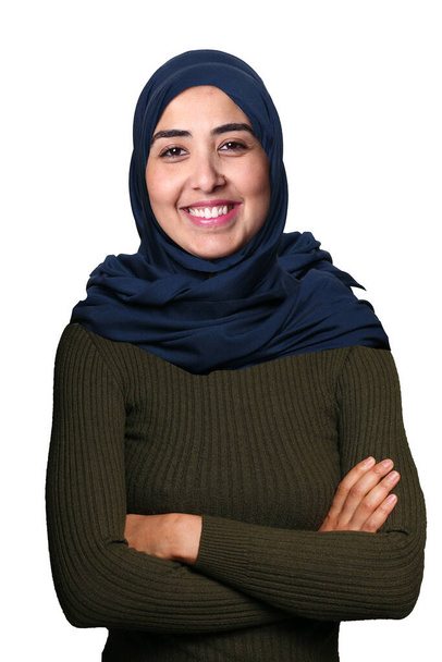 Beautiful young Arabic Muslim woman in front of a white background - Foto, Imagem
