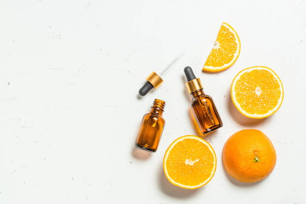 Vitamin C. Cosmetic products and fresh citrus fruits. - Foto, Imagem