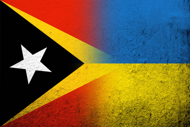 The Democratic Republic of Timor-Leste with National flag of Ukraine. Grunge background - Фото, зображення