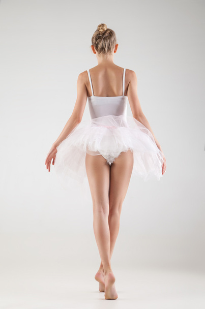 Ballerina in classical tutu over white background - Foto, Bild