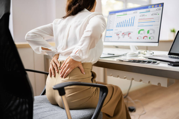 Back Pain Bad Posture Woman Sitting In Office - Photo, image