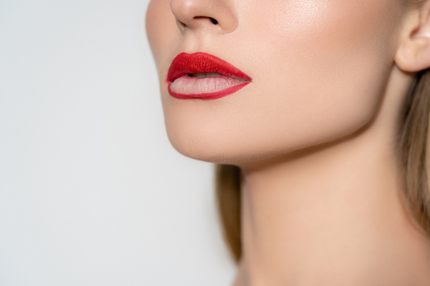 Cropped view of woman with red lips isolated on grey  - Фото, зображення
