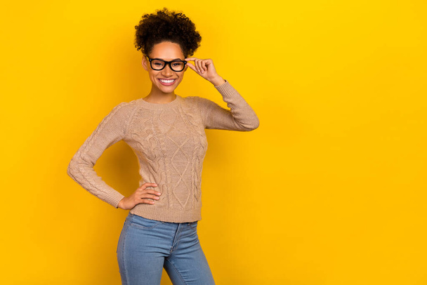 Photo of cute clever lady dressed beige pullover arm glasses empty space isolated yellow color background - Φωτογραφία, εικόνα