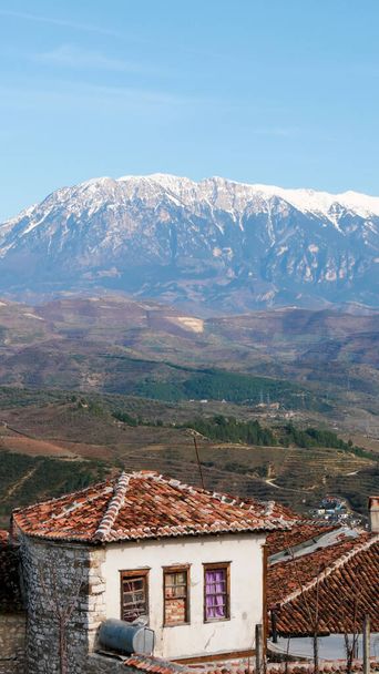 Berat, Albania and a mountainous background on a sunny afternoon - Фото, изображение