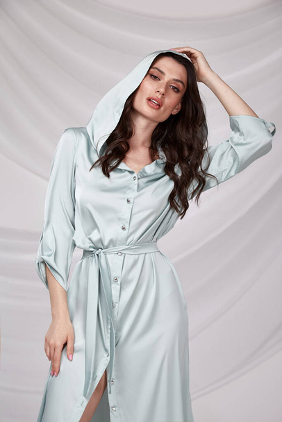 Beautiful sexy brunette woman wear summer collection dress style cruise collection fashion model silk textile elegant clothes makeup cosmetic glamour studio. - Valokuva, kuva