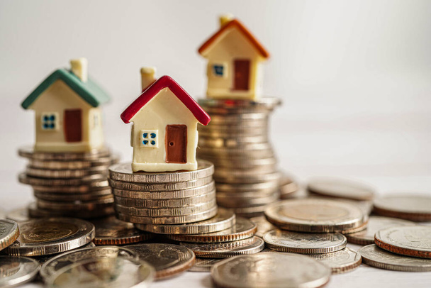 House on stack of coins, Investment property finance concept. - Fotografie, Obrázek
