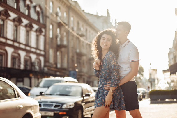 Young couple in love having fun, spending time together in the city. Relationship concept, young love - 写真・画像
