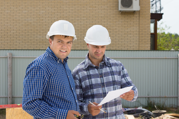 Male Building Engineers Visiting Construction Site - Fotografie, Obrázek