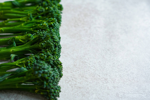 Broccolini on a white table - 写真・画像