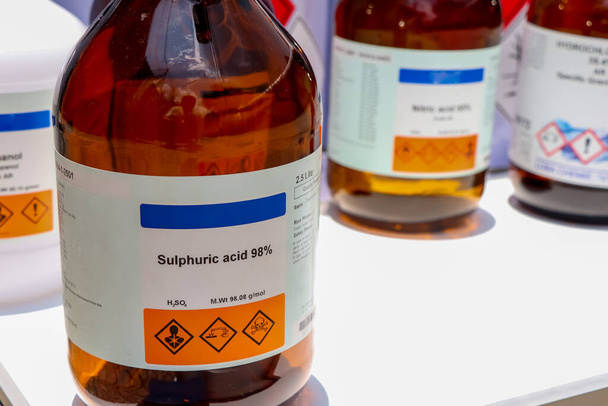 sulfuric acid in bottle, chemical in the laboratory and industry - Photo, Image