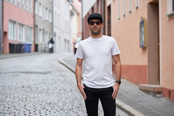 White blank t-shirt on a hipster handsome male model with space for your logo or design in casual urban style - Fotografie, Obrázek