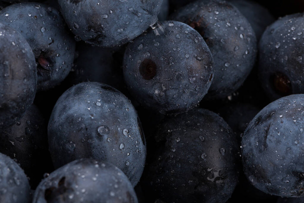 Fresh blueberries with water drops - close up background - Foto, Imagen