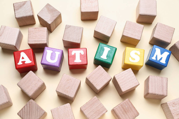 Word AUTISM made of cubes on light background - Foto, immagini