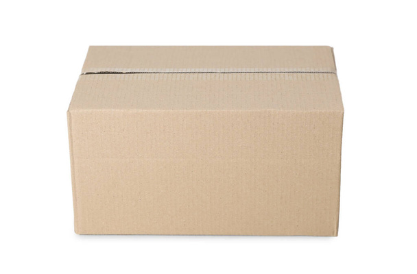 One closed cardboard box isolated on white - Zdjęcie, obraz