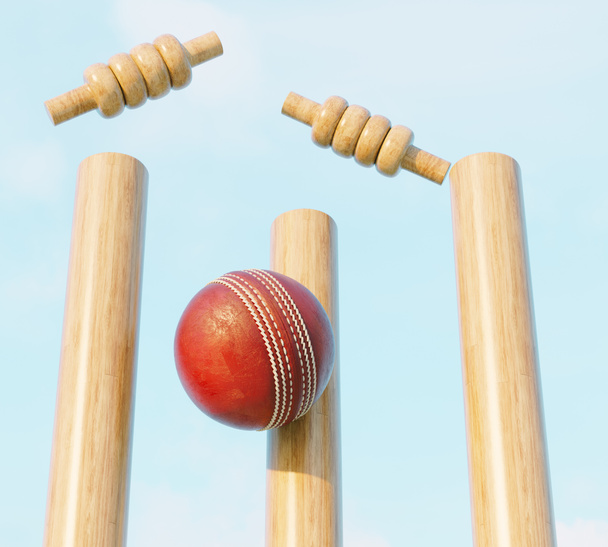 Wooden cricket wickets with dislodging bails on a day sky background - 3D render - Valokuva, kuva