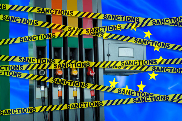 A gas station with glued films with the inscription "sanctions". - Fotoğraf, Görsel