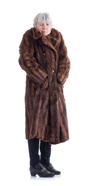 Woman with a fur coat on a white background - Foto, Imagem